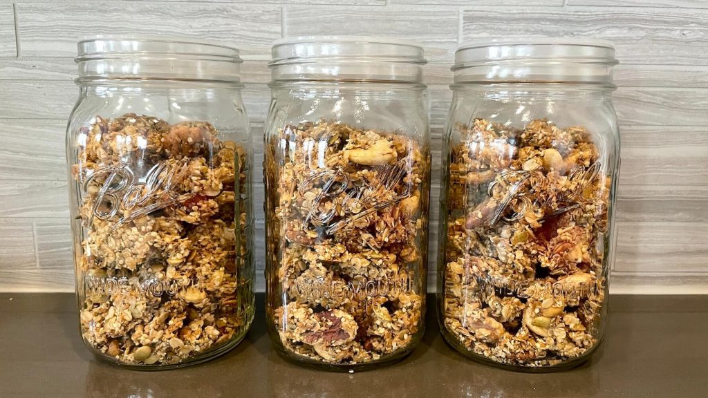 Easy Homemade Granola Recipe Stored in Mason Jars